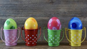 Colorful Eggs in Small Colorful Buckets